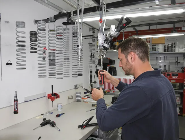 Brunswick Garage Door Repair safety certified technician performing precision spring replacement in Brunswick